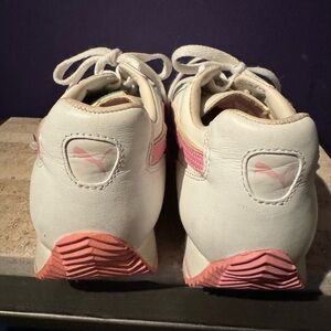 White Puma sneakers, size 7-1/2 with pink accent